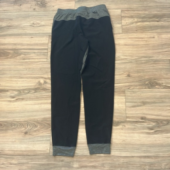 BRAND NEW UNDER ARMOUR  WORKOUT PANTS SIZE YXL - Picture 2 of 4